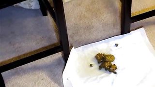 Hot ebony pooping on two black chairs