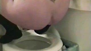 Blonde teen upset while pooping