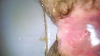 Creampied hairy woman peeing