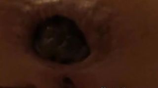 Close up of a sexy woman pooping