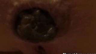 Close up of a sexy woman pooping