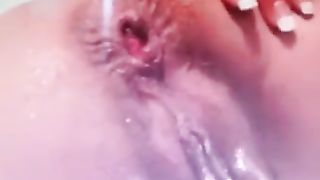 Cam girl fingering her perfect shaved butthole