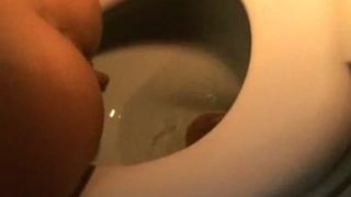 Amateur girl shitting in toilet