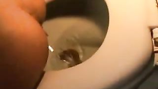 Amateur girl shitting in toilet