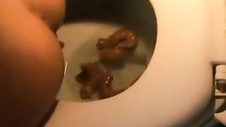 Amateur girl shitting in toilet