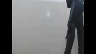 Wearing black latex while pooping