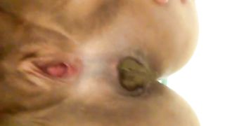 Fat granny pooping a long turd