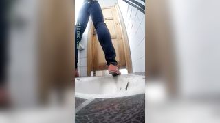 Brunette teen shitting in public bathroom