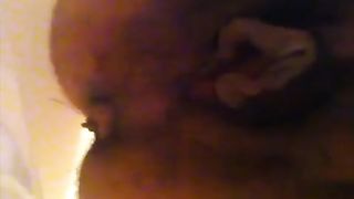 Hairy babe shitting in close up