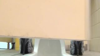 Brunette milf pooping in public bathroom