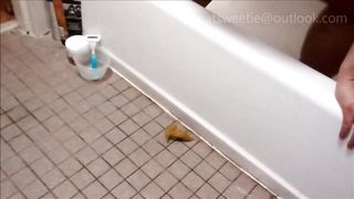 Fat black girl pooping on bathroom floor