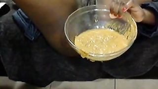 Black woman did a mess in a plastic bowl