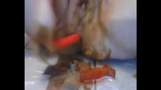German babe smearing crap on her pussy