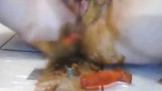 German babe smearing crap on her pussy