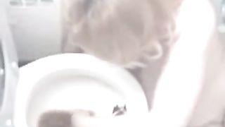 Blonde wife eating poop from toilet