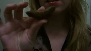 Blonde housewife tasting fresh poop