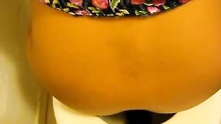 Hot teen shitting over toilet