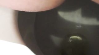 Shaved wife pooping a big one