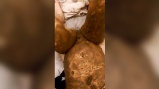 Fat wife smearing poop on her naked body