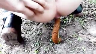 Amateur slut pooping in nature