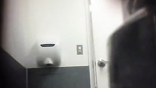 Sexy blonde babe shitting in public bathroom floor