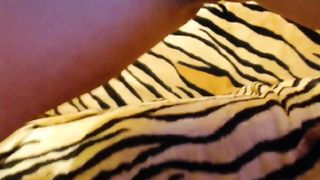 Shaved girl peeing in a glass