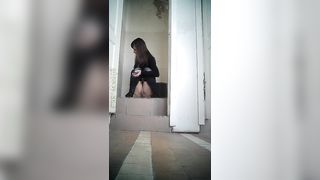 Sexy girl shitting in public bathroom