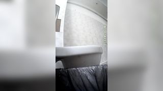 Sexy girl shitting in public bathroom