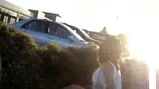 Amateur girl peeing in a public place