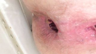 Shaved girl peeing and pooping