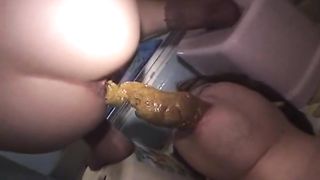 Japanese girl dropped a big turd on slaves face