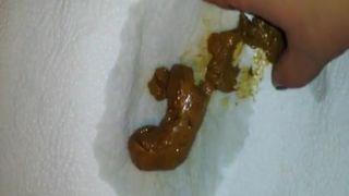 Sexy milf smearing poop on her big ass