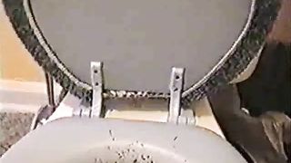 Chubby blonde girl shitting in toilet