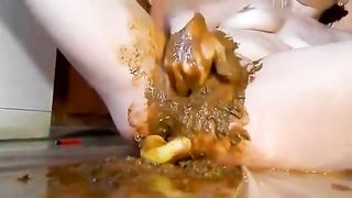 Stuffed her pussy with poop