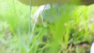 Chubby girl peeing in her back yard