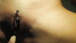 Sexy teen peeing while fingering her pussy