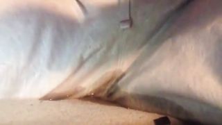 Girl peeing in sweat pants