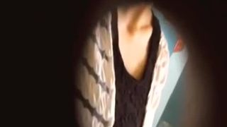 Spying on a milf peeing