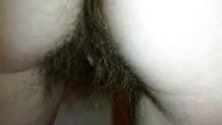 Hairy wife peeing in close up