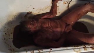 Sexy babe masturbating with liquid poop