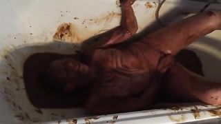 Sexy babe masturbating with liquid poop