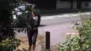 Sexy babe peeing in the bushes