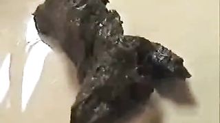 Having fun while pooping in kitchen