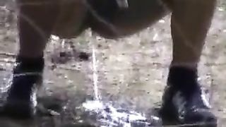 Amateur girl peeing outdoor