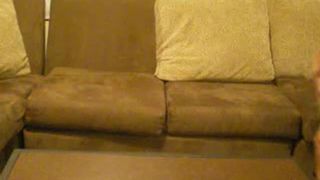 Amateur babe peeing on a sofa