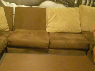 Amateur babe peeing on a sofa