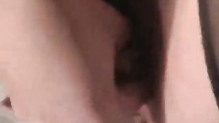 Masturbating with a long dildo