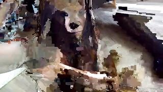 Beautiful brunette covered herself in poop