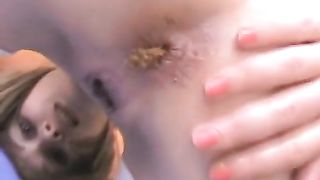 Smearing her own poop