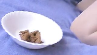 Smearing her own poop